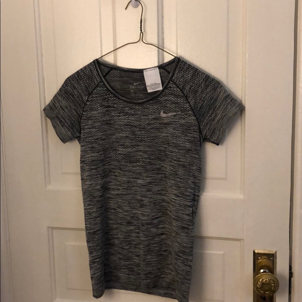 Nike- Dri-fit short sleeve shirt